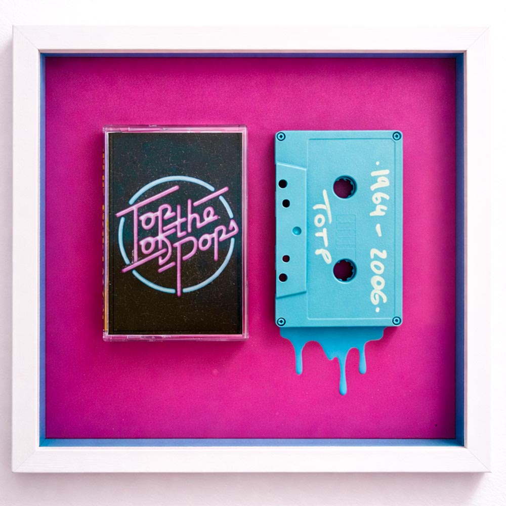 Top of the Pops cassette artwork (1964–2006) in a box frame with art glass.